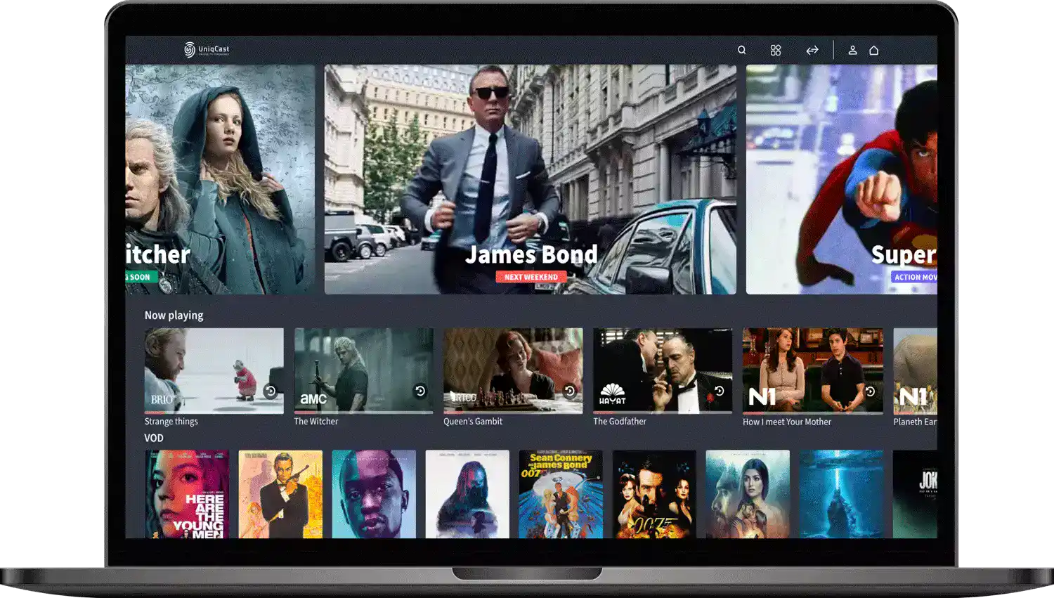 Laptop showing OTT service, dashboard section with movie posters
