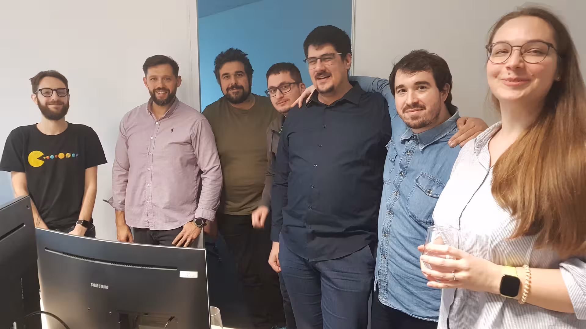 The mage shows members and/or employees of UniqCast team.