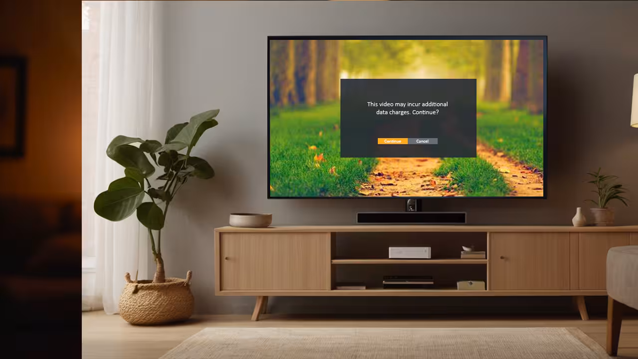 A television shows a video featuring a scenic park filled with greenery, walking paths, and visitors relaxing.