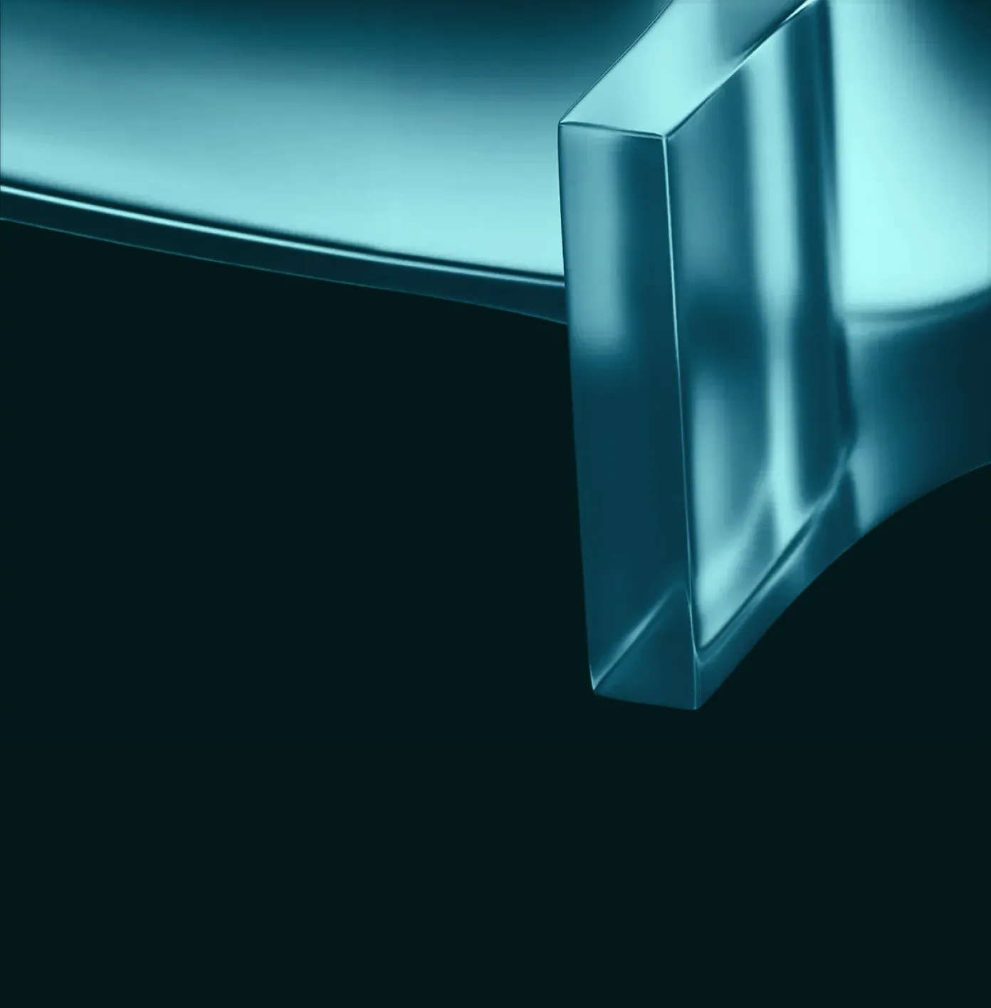 Close-up of a sleek, metallic blue abstract shape with smooth reflective surfaces.