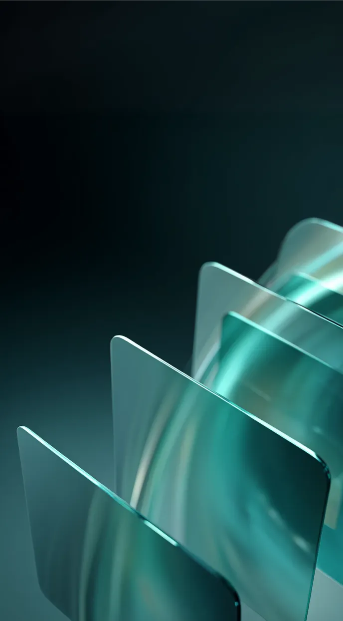 Abstract close-up of overlapping translucent blue-green glass panels with smooth rounded edges against a dark background.