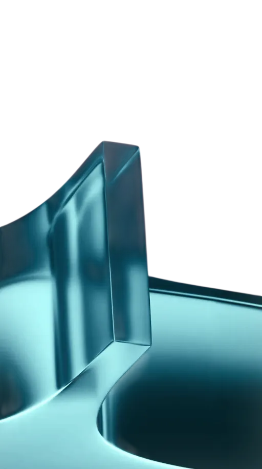 Close-up of a translucent blue crystal or glass sculpture with smooth curves and angular edges.