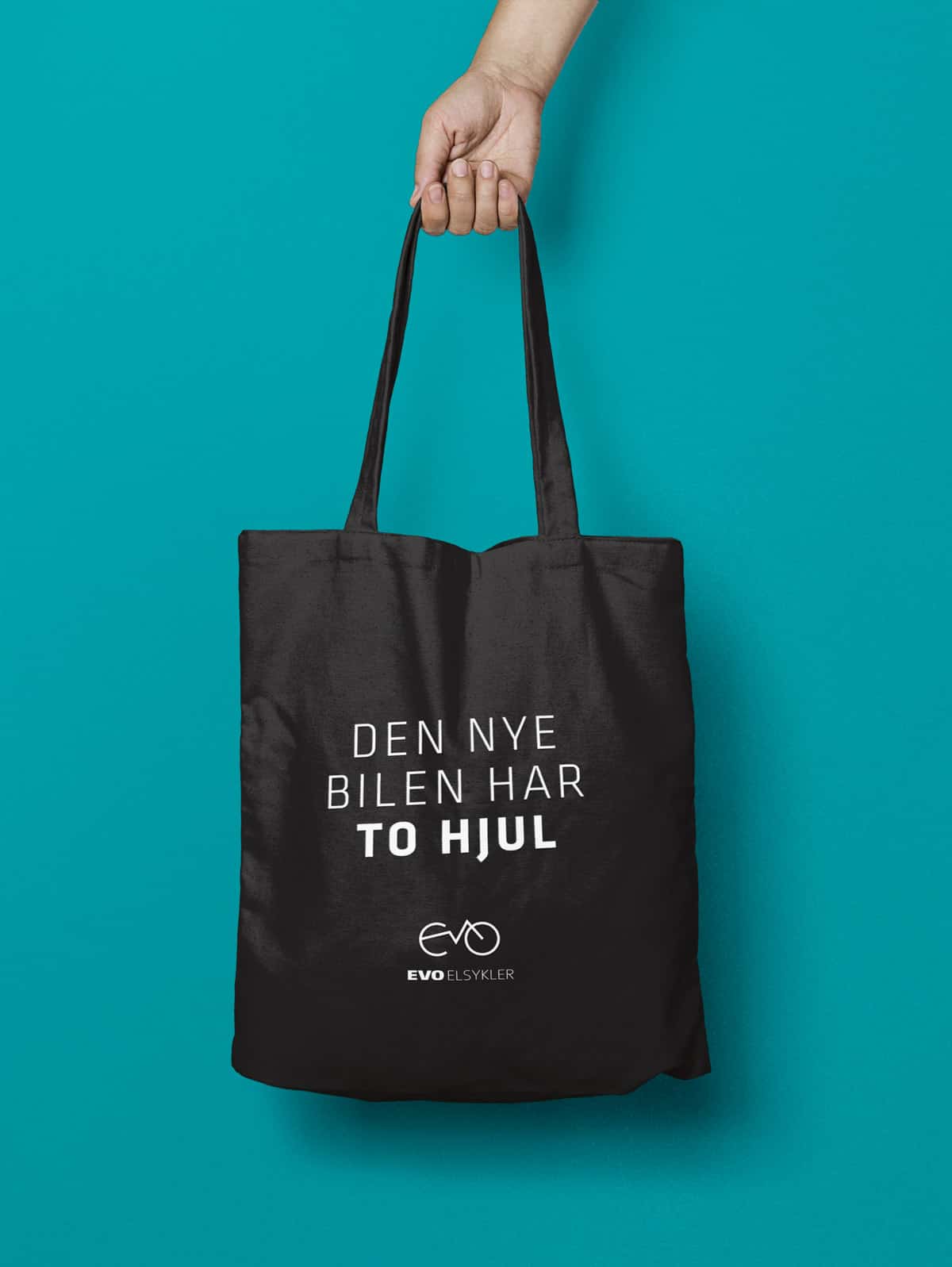 EVO totebag med teksten «Den nye bilen har to hjul»