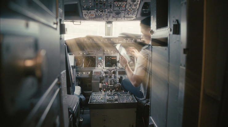 Pilots using digital tools to communicate on the aircraft handling.