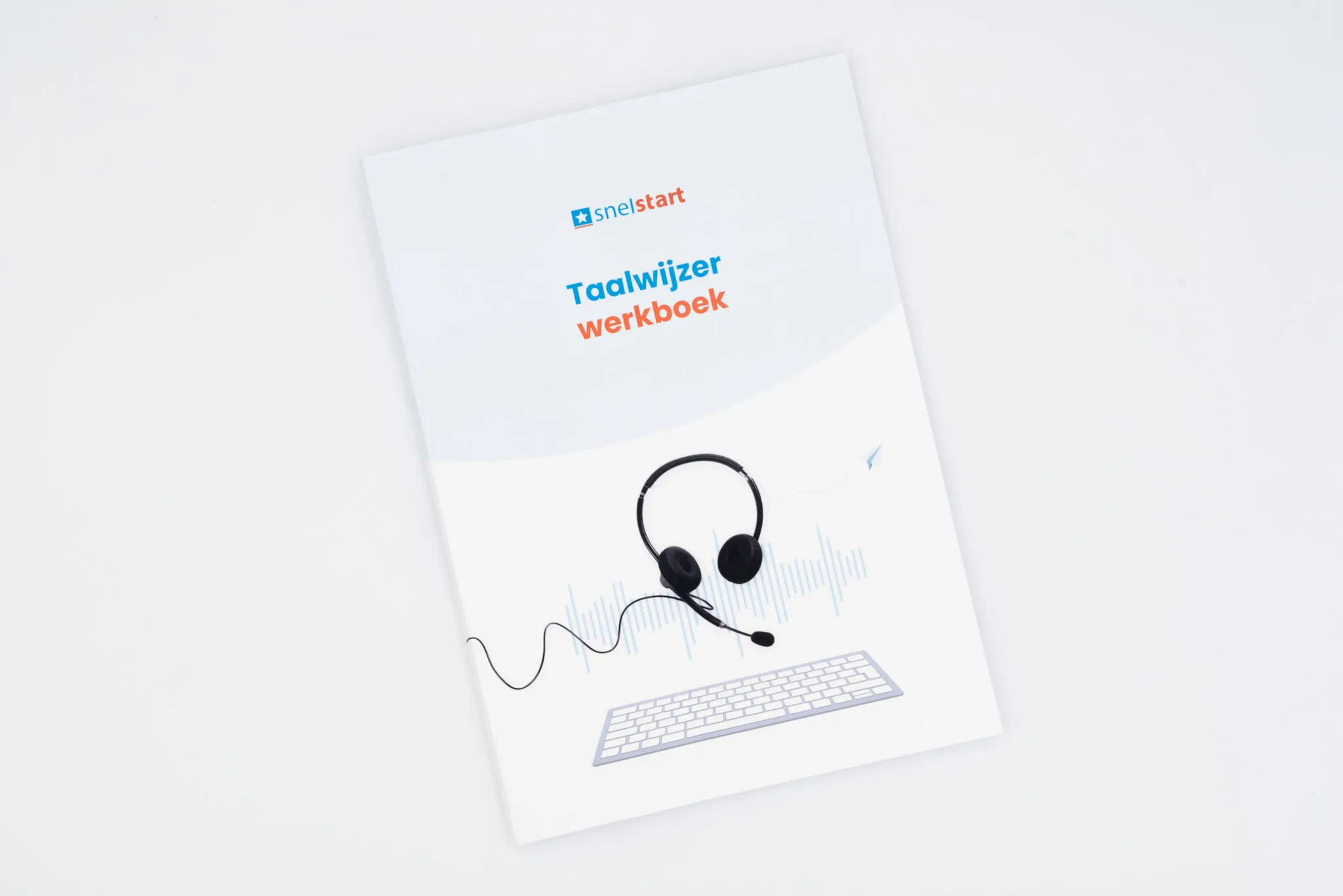 Foto van de buitenzijde van het SnelStart taalwijzer werkboek, geschreven door Jonneke Duin.