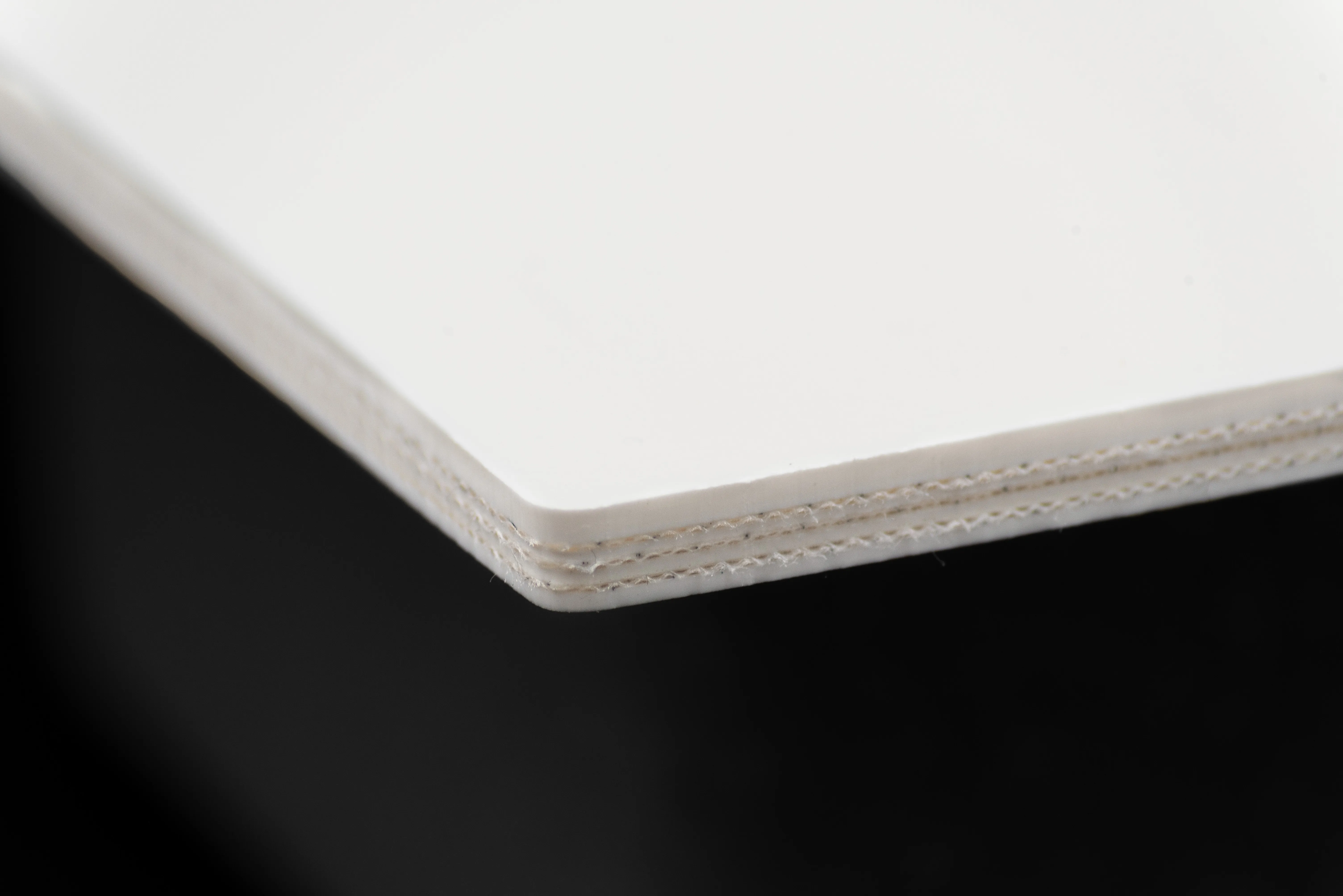 Productfotografie door JD&D Tekst & design. Dit is een detailfoto van een transportband.