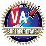 Badge with a gold starburst border featuring a red and blue circle, an arrow pointing upward, and the text 'Veckans Affärer VA Superföretagen'.