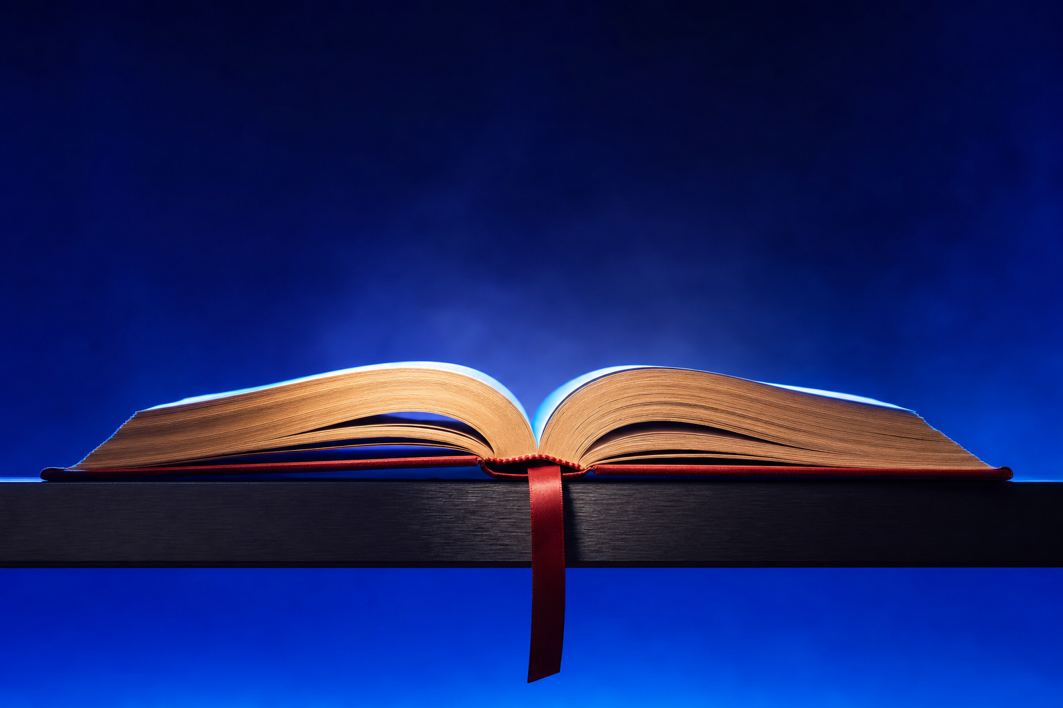 An open book with bookmark representing customer education compounding adoption.
