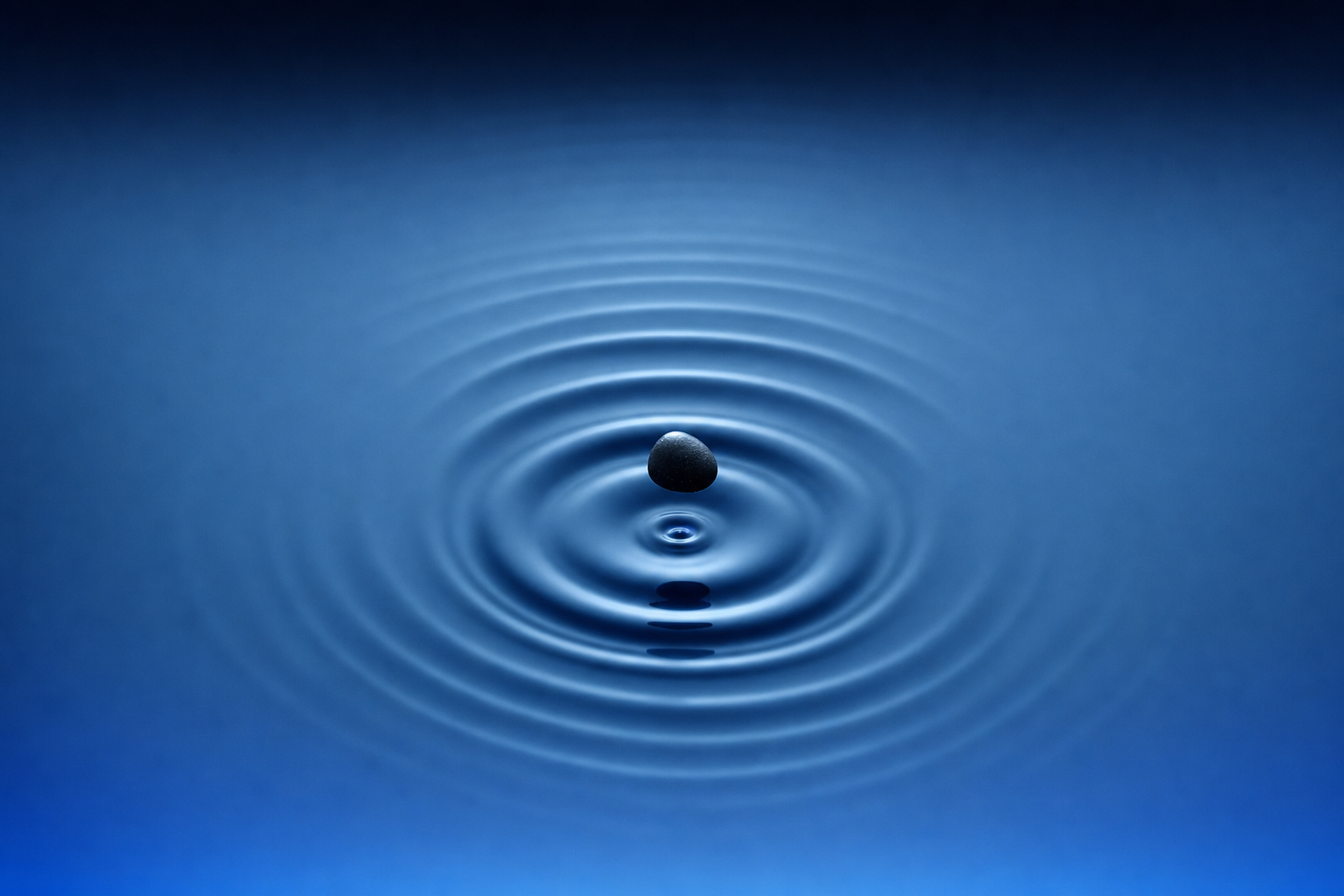Concentric ripples spreading across still water, showing how category narrative spreads on social first.