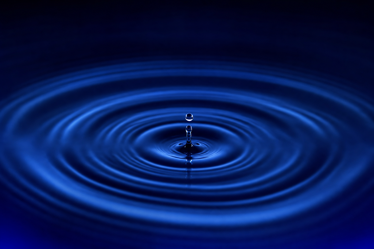 A single drop creating ripples far larger than itself, showing the ASC market's scale is bigger than founders realize