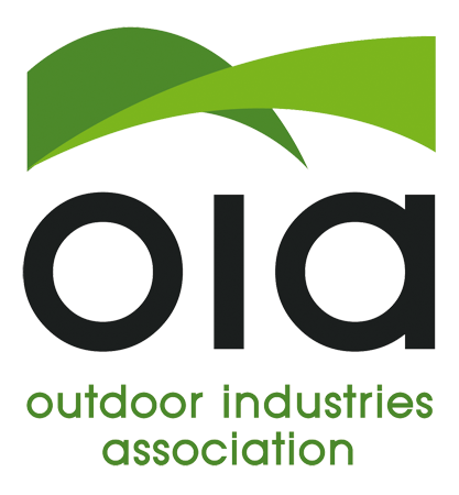 Logo of Outdoor Industries Association with stylized green hills above black lowercase letters 'oia'.