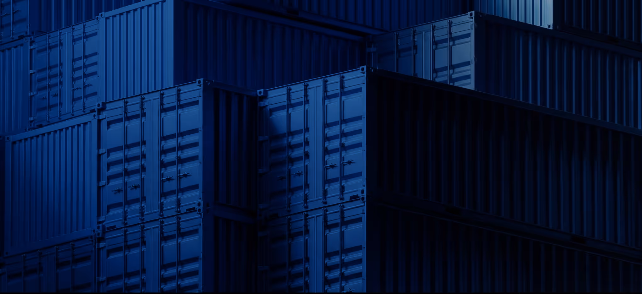 Stacked blue shipping containers with visible doors and locking mechanisms.