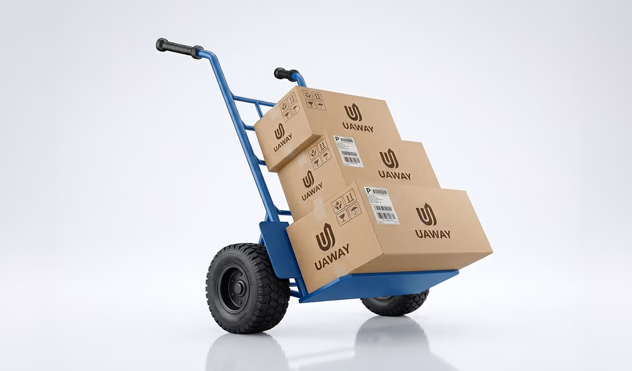 Blue hand truck loaded with four brown cardboard boxes labeled UAWAY.