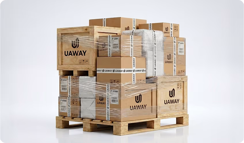 Stacked wooden and cardboard shipping boxes wrapped in plastic on a wooden pallet, all branded with UAWAY logos.