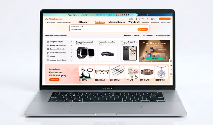 MacBook laptop displaying Alibaba.com homepage with AI Mode, product categories, and promotional items.