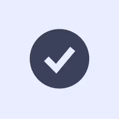 White checkmark inside a dark circle on a light background representing confirmation or success.