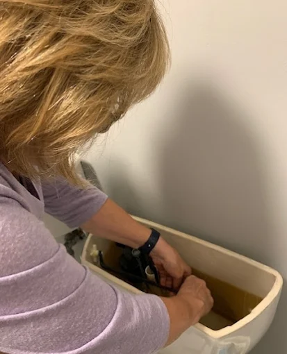 Bathtub installation in Charleston, SC - professional plumber working on toilet and bathtub repair