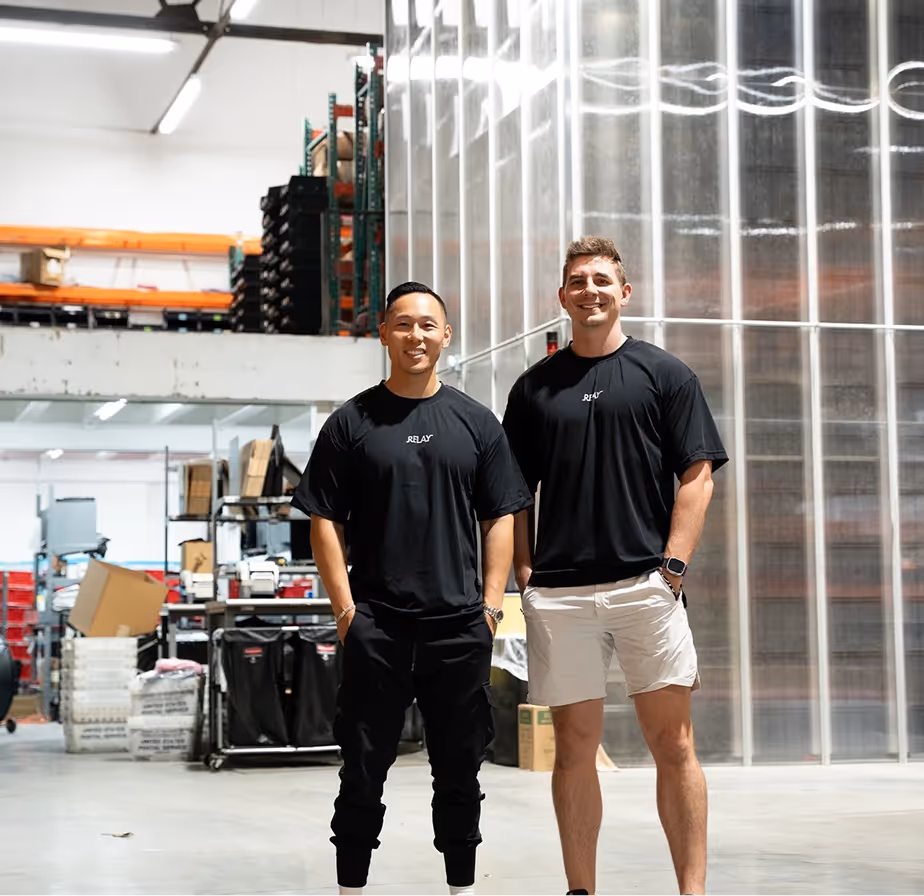 Derek and Daniel in the warehouse