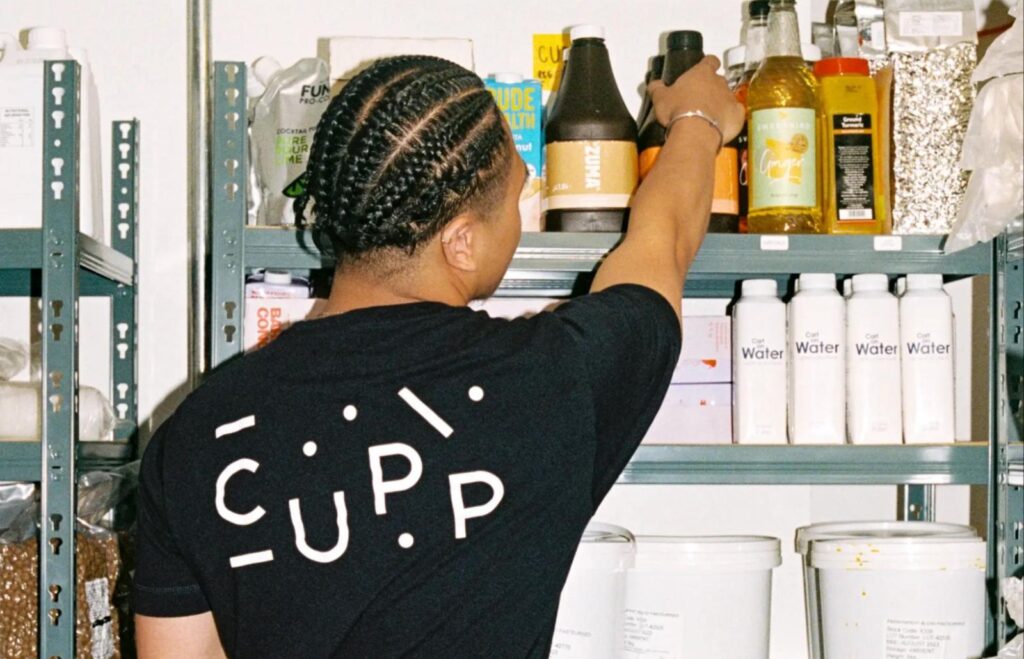 CUPP employee taking stock from shelves