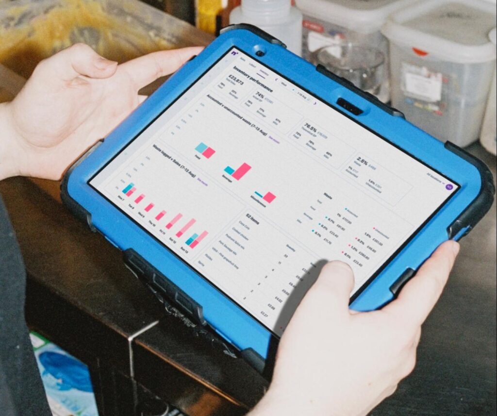 Restaurant operator using Nory's inventory performance on a tablet