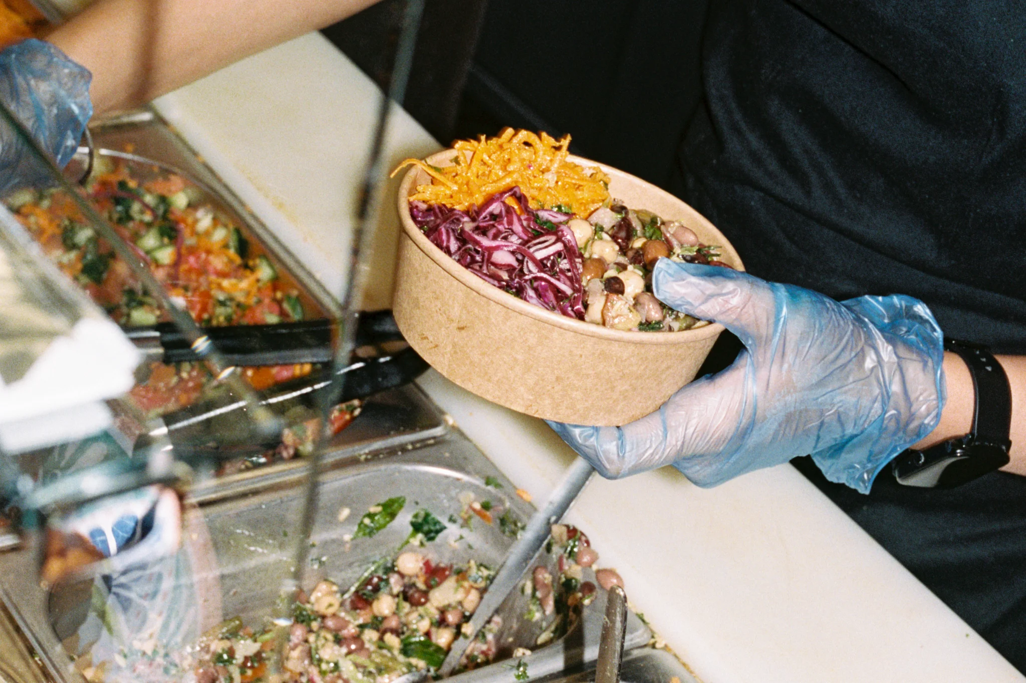 Eat a Pitta preparing a falafel salad bowl