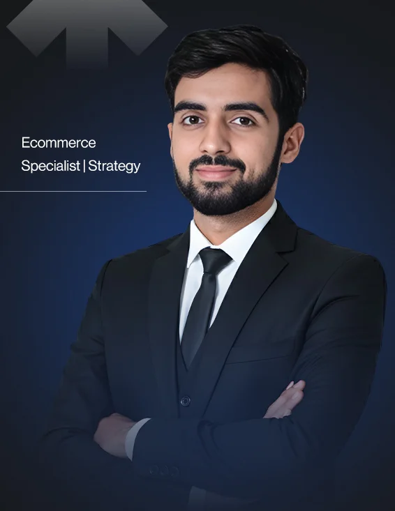 Portrait of a confident man with beard in a black suit and tie against a dark background, with text 'Ecommerce Specialist | Strategy'.
