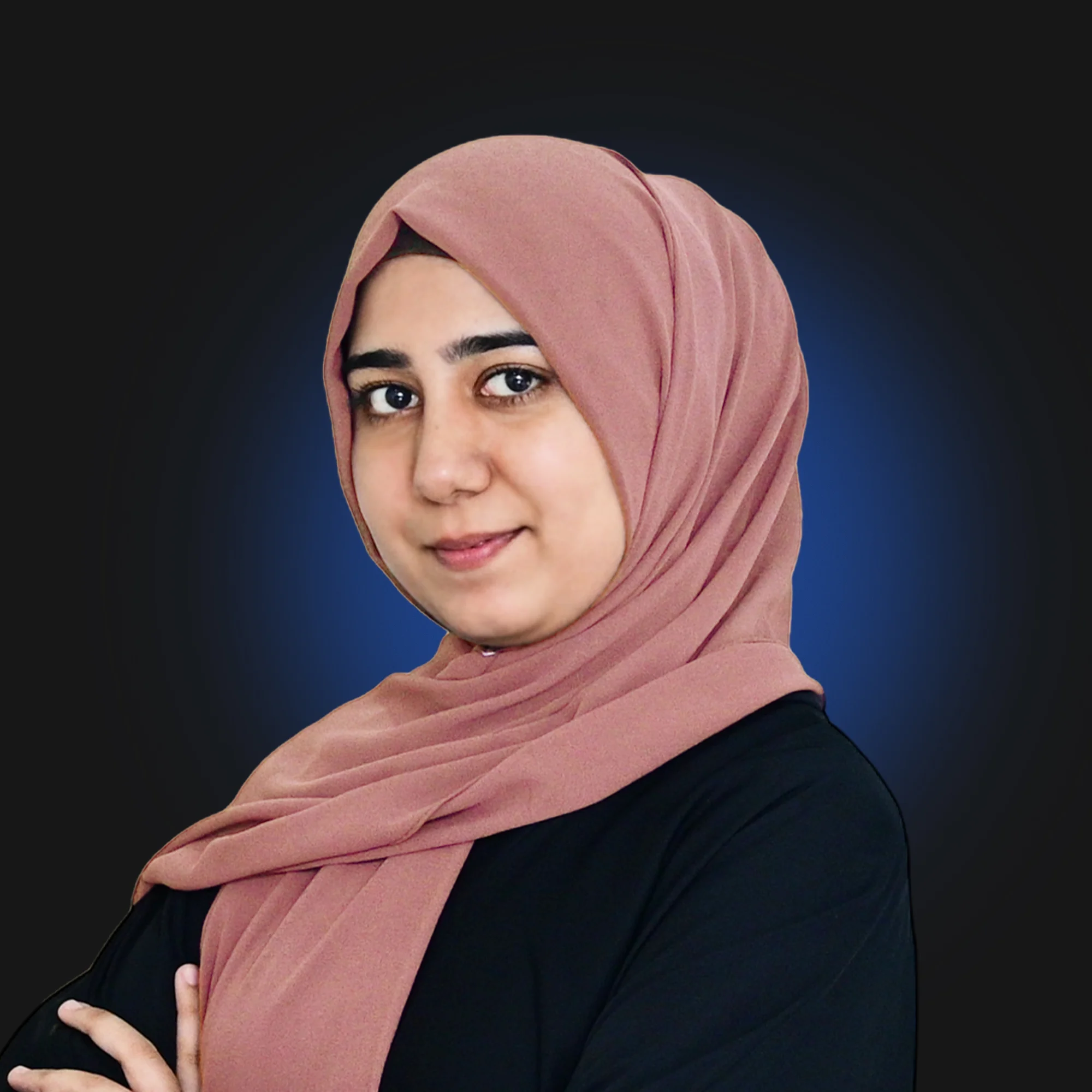Woman wearing a red hijab and black outfit with arms crossed against a dark blue background.