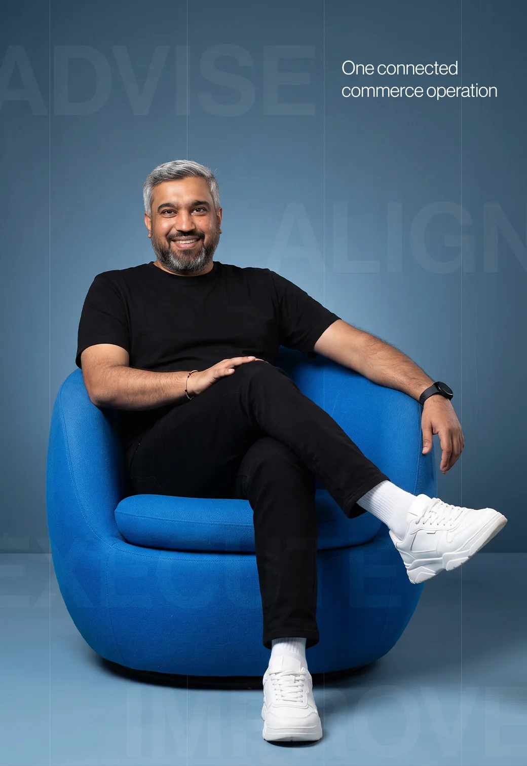 Smiling man with gray hair and beard wearing a white shirt, with text stating 15 years of combined ecommerce experience on a dark blue background.