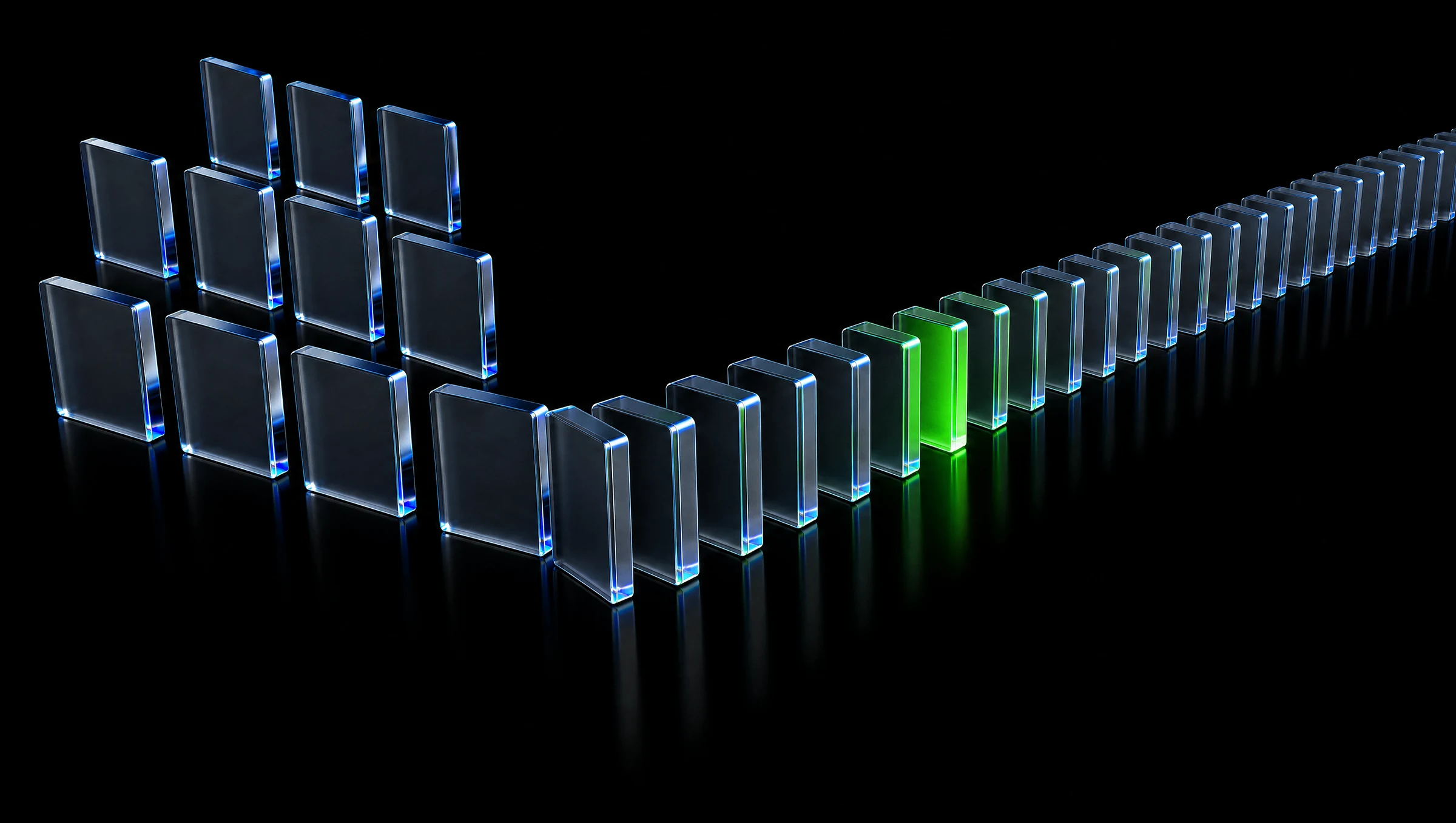 A shallow field of dark glass slabs, one of them lit with signal green light that refracts through its neighbours.