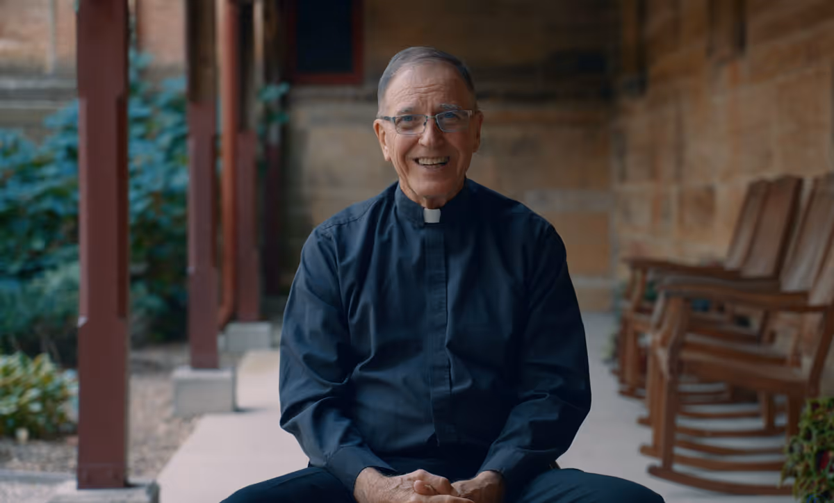 Smiling Priest