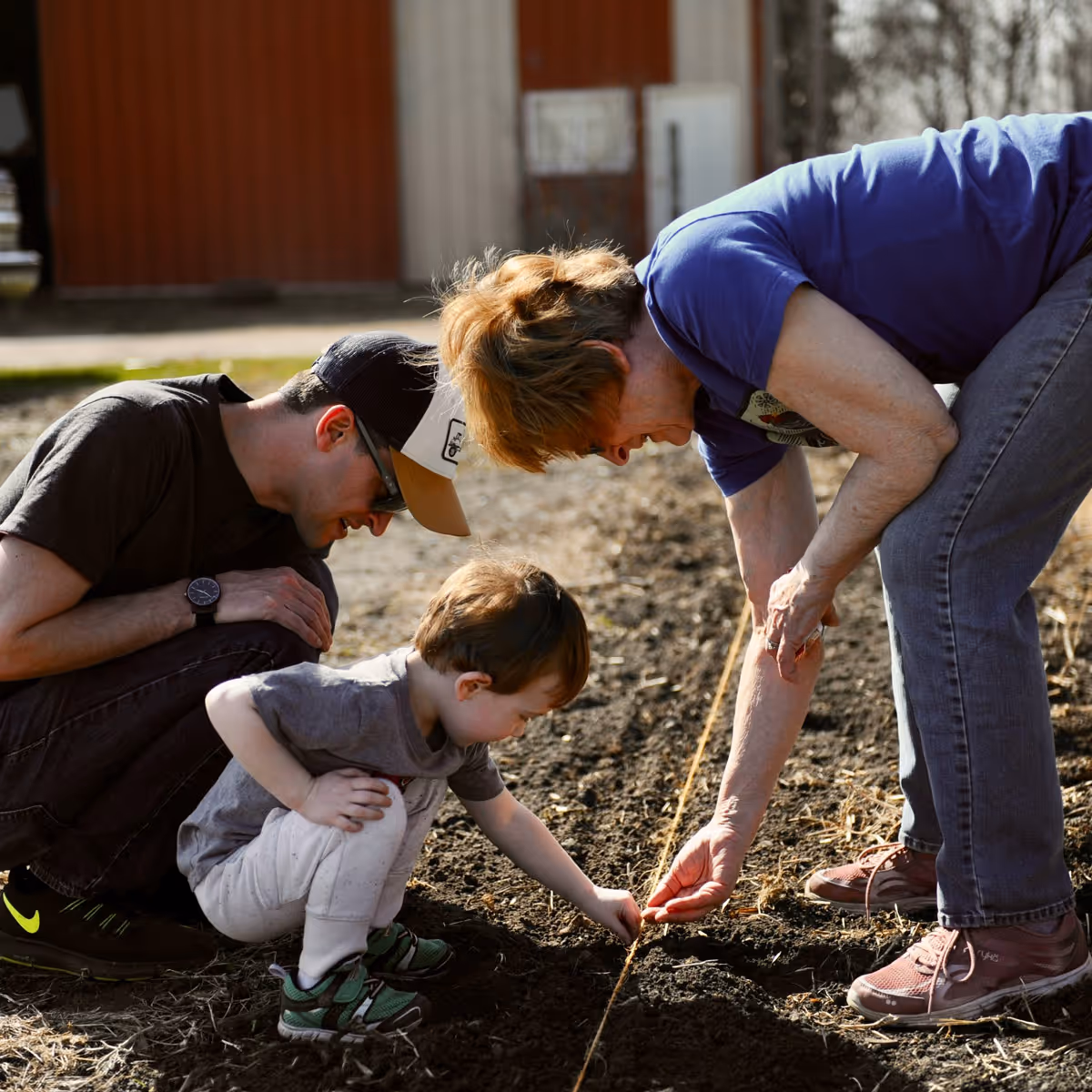 Family planting seedsd