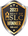 Shield-shaped badge with gold text stating 2023 Best of SLC Winner from inbnd.