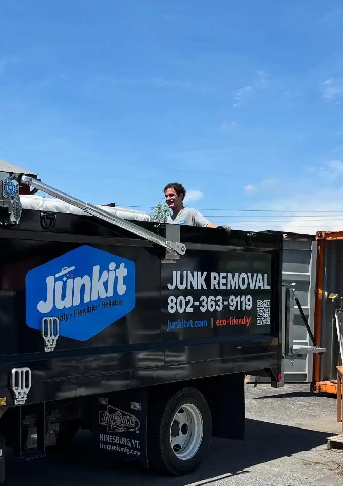 Junkit team unloading items for donation at a local drop-off location