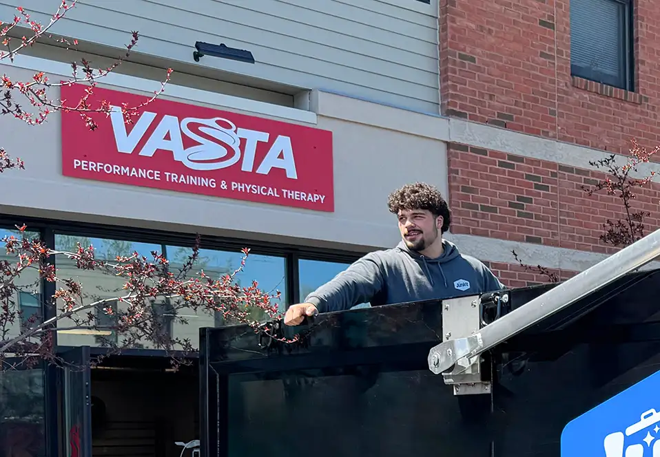 Junkit cleanout service removing items from commercial property in Chittenden County Vermont