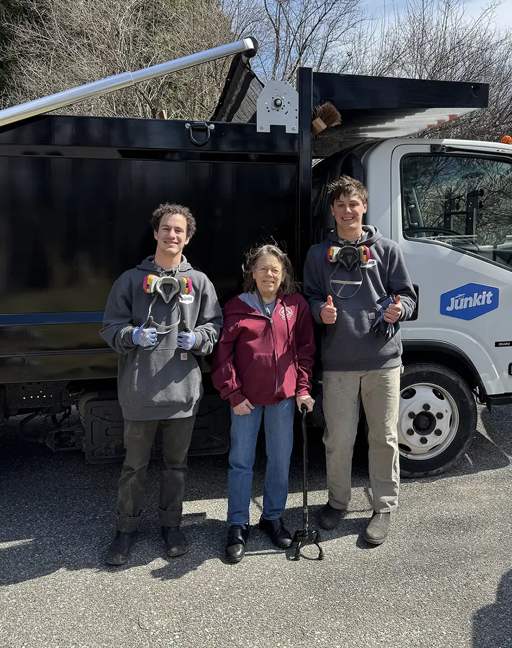 Junkit team with customer after completing a pickup