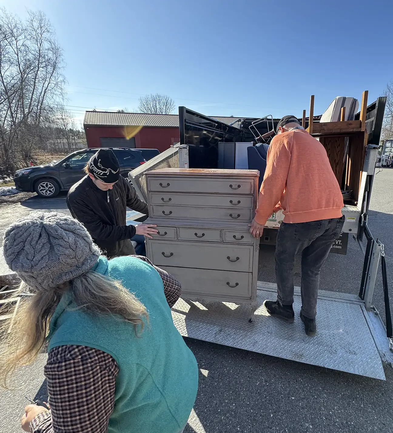Junkit team unloading donation items for Habitat for Humanity in Williston