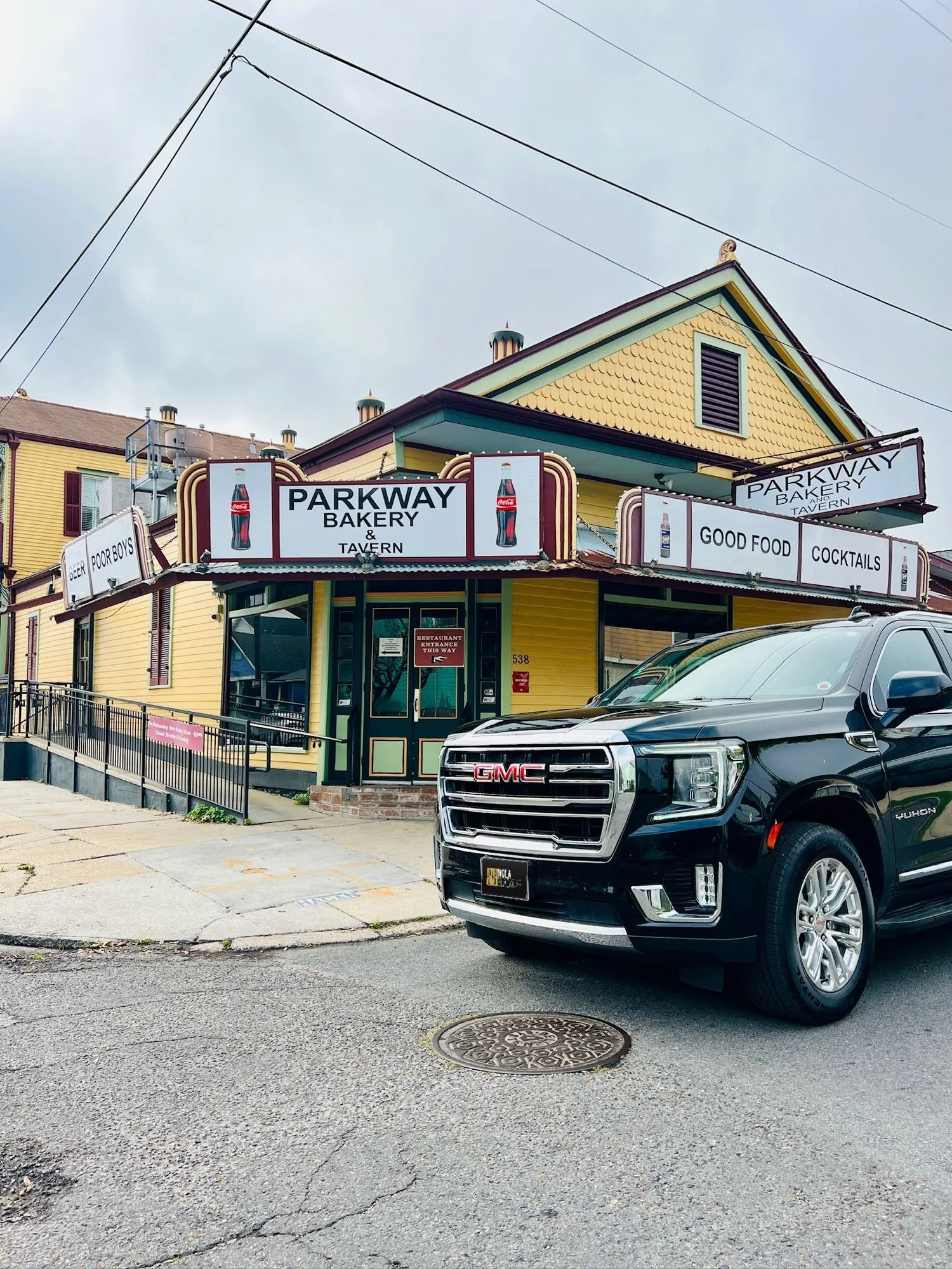 Black SUV outside Parkway Bakery in Mid-City New Orleans