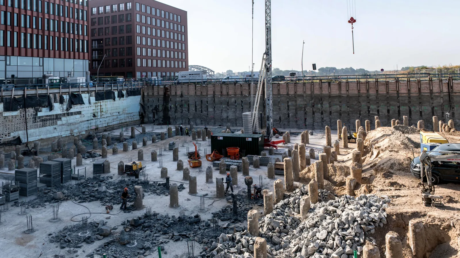 Foundation piles in an excavation on a construction site