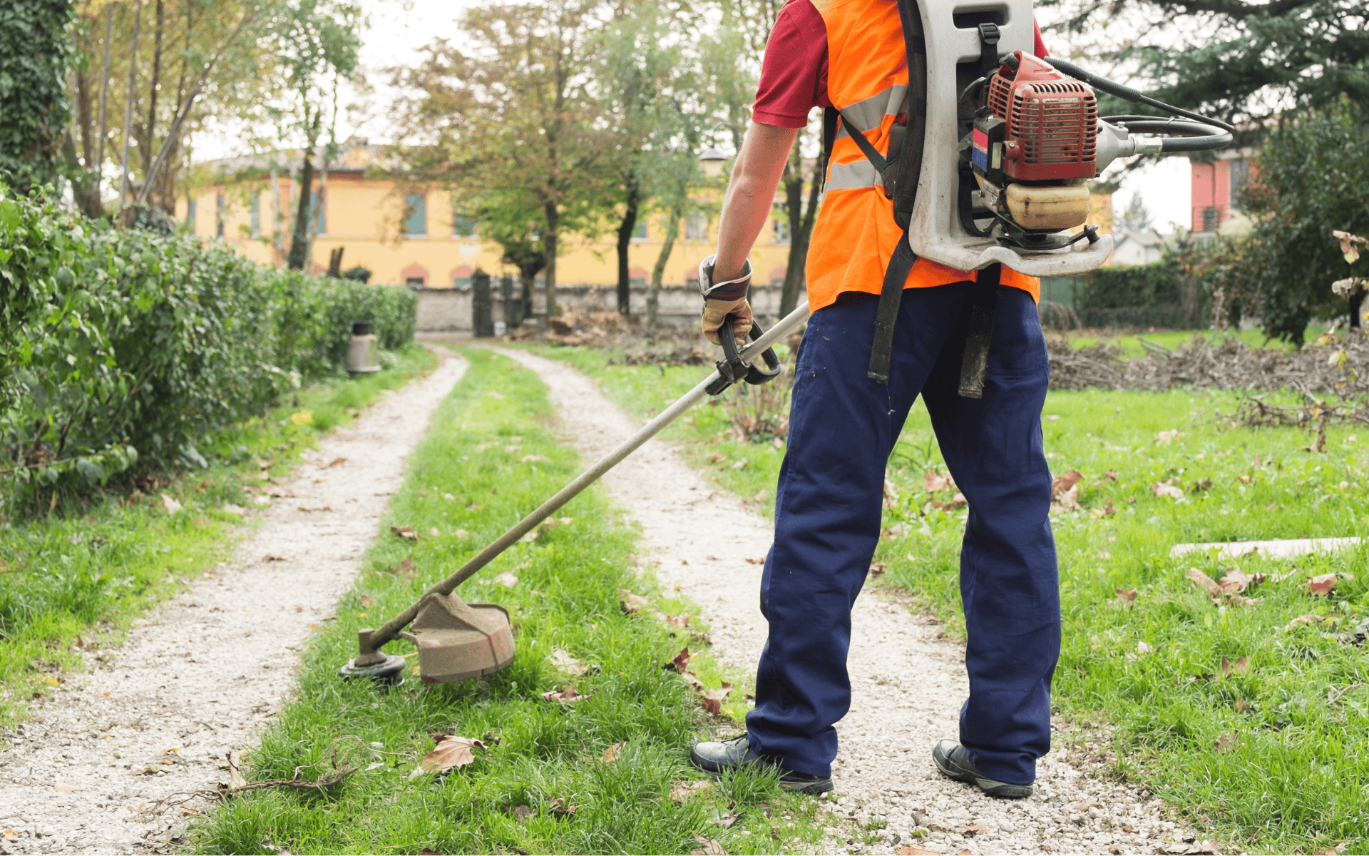 Worker string trimming yard in Sapulpa