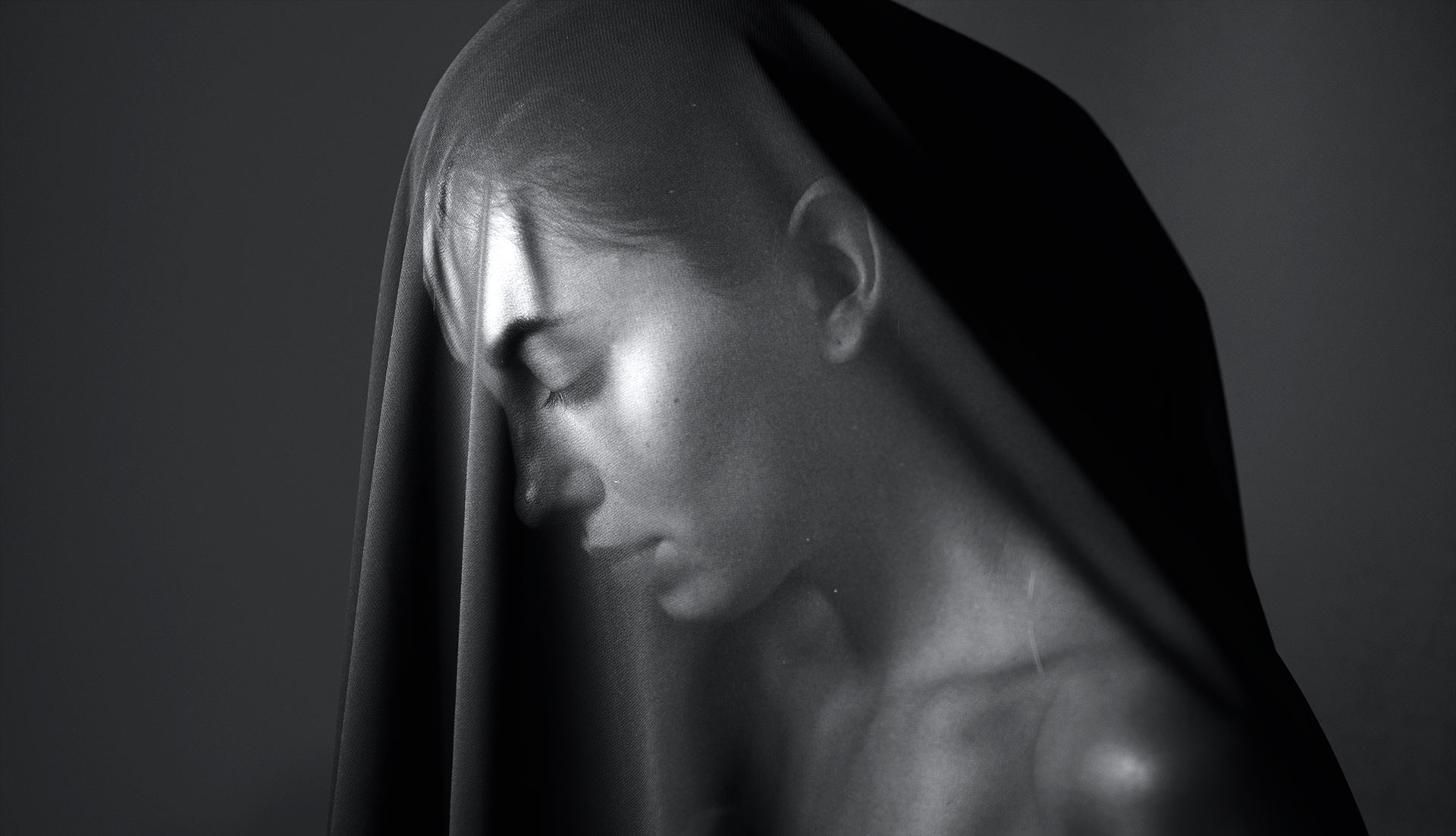 A beautiful woman in a transparent shawl.