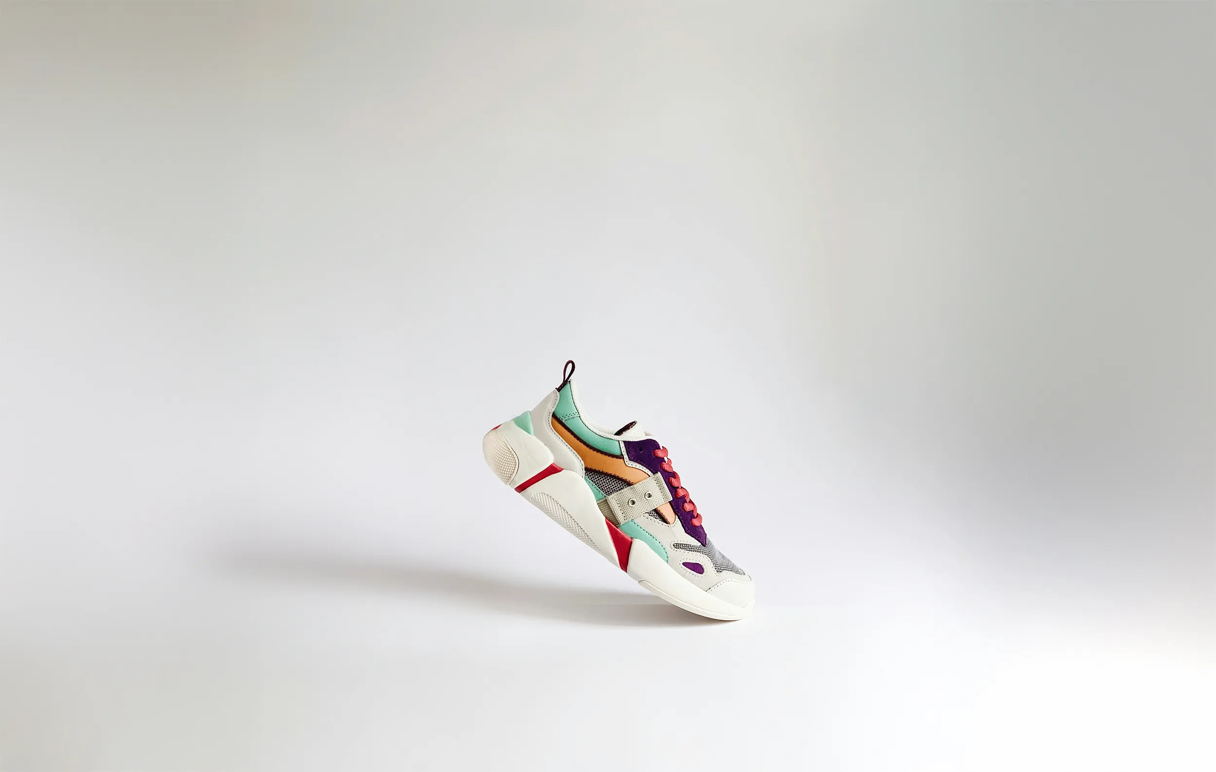 A single shoes in white background.