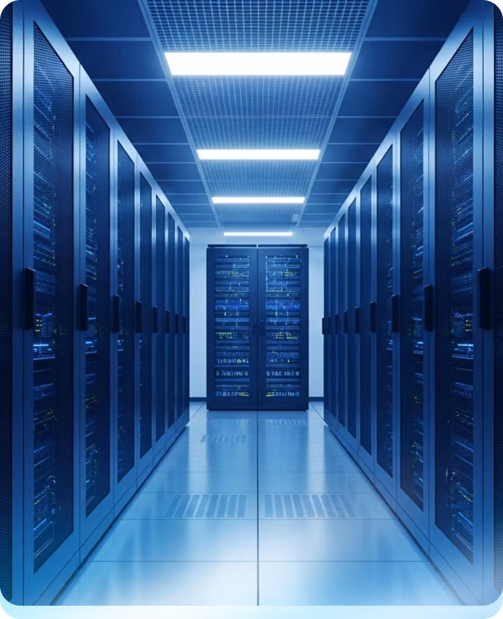 A brightly lit data center corridor with rows of server racks on both sides and two servers at the end.