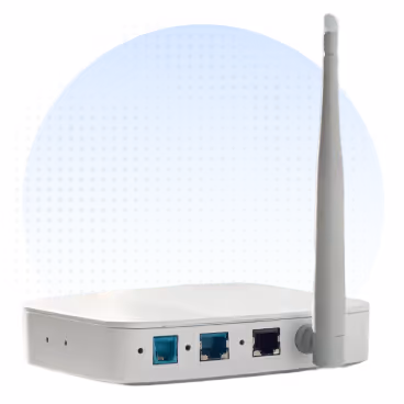 White wireless analog gateway device with one antenna and Ethernet ports, emitting a blue signal wave.
