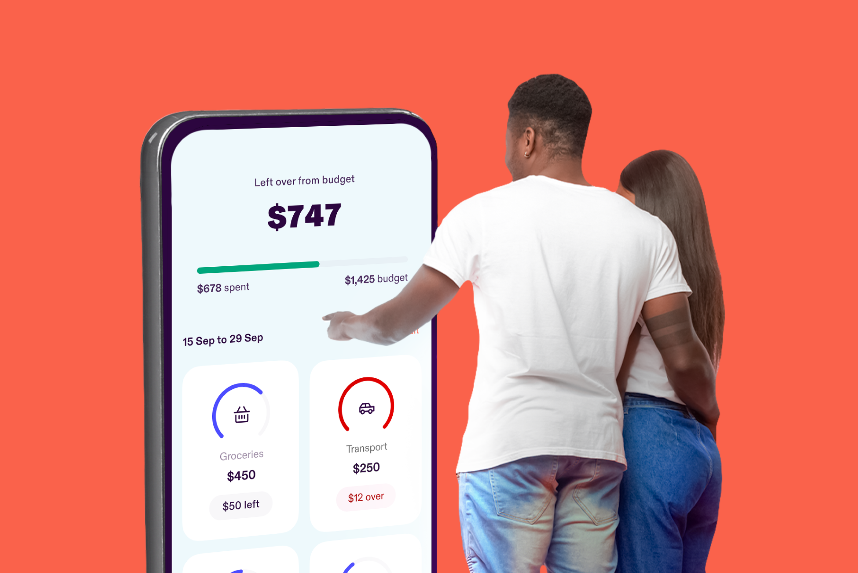 Couple looking to a big phone screen
