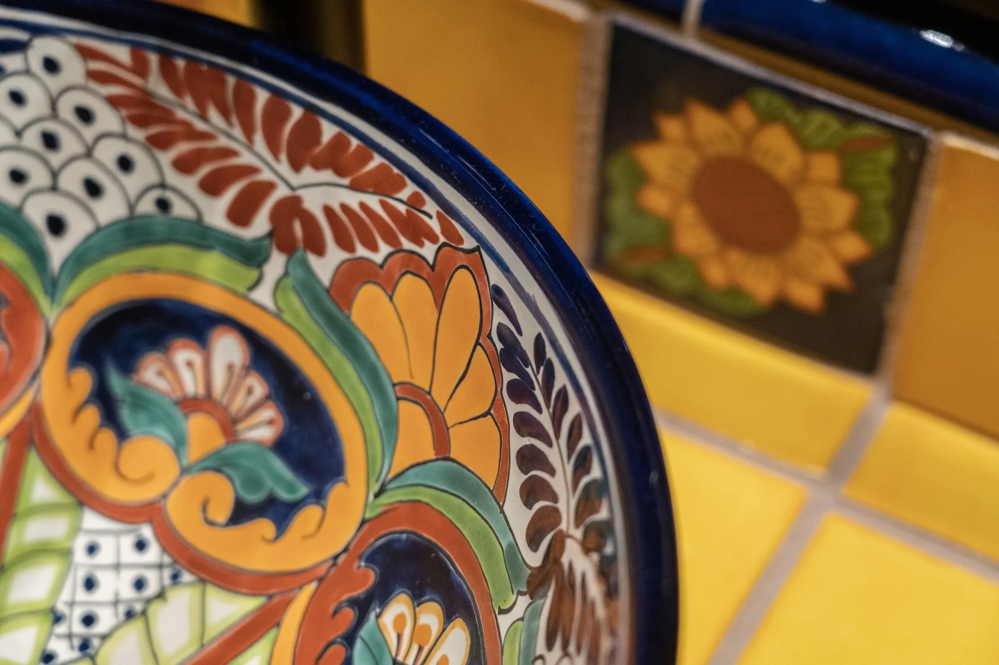 Colorful hand-painted ceramic plate with floral patterns