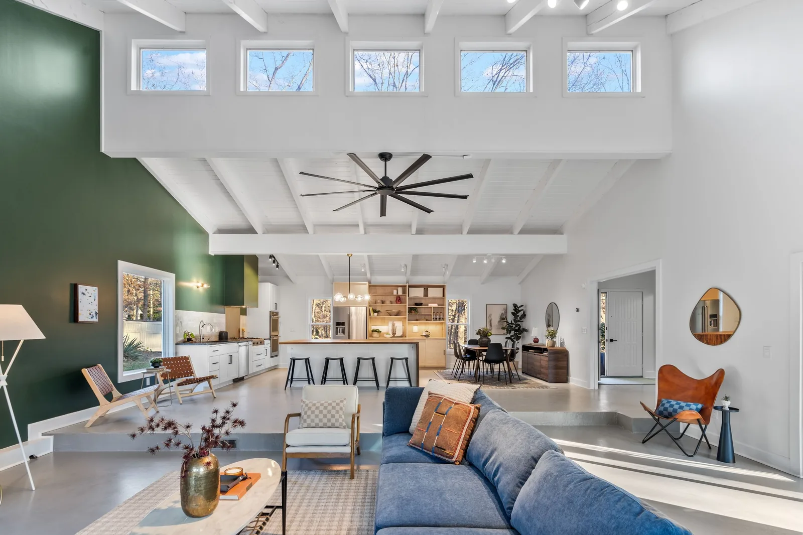 Modern rental interior with an open living and dining area