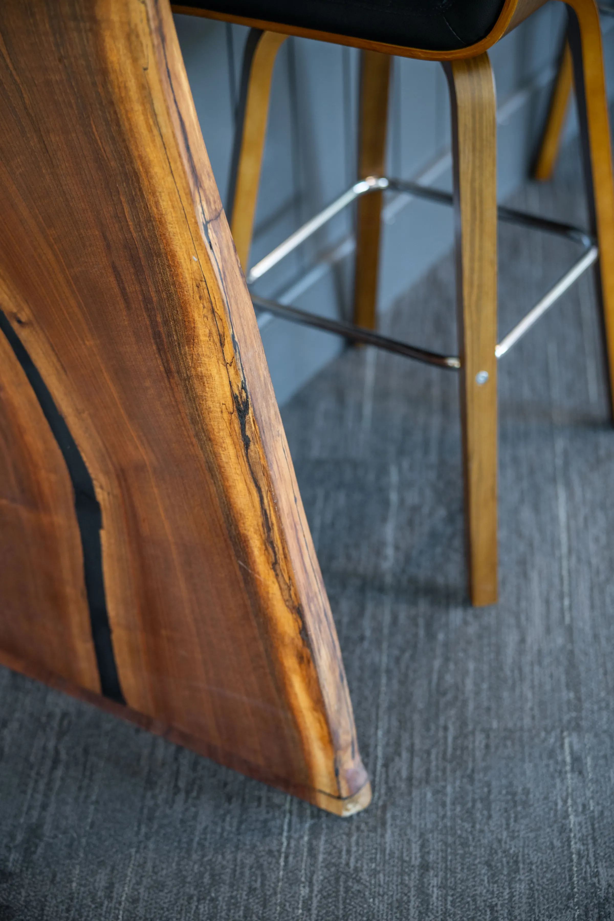 Close view of the wood screen and interior architectural materials