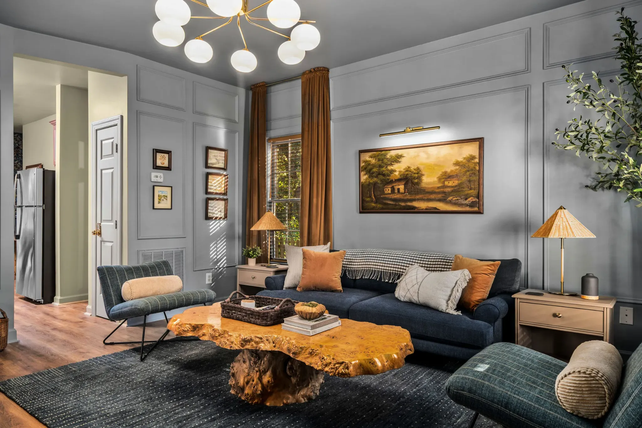 Styled living room with carefully arranged furniture and soft furnishings