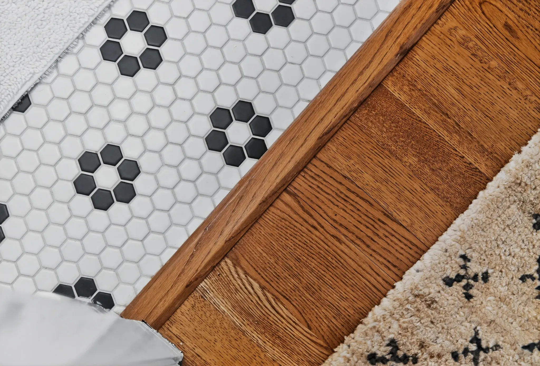 Patterned tile flooring and transition between finishes