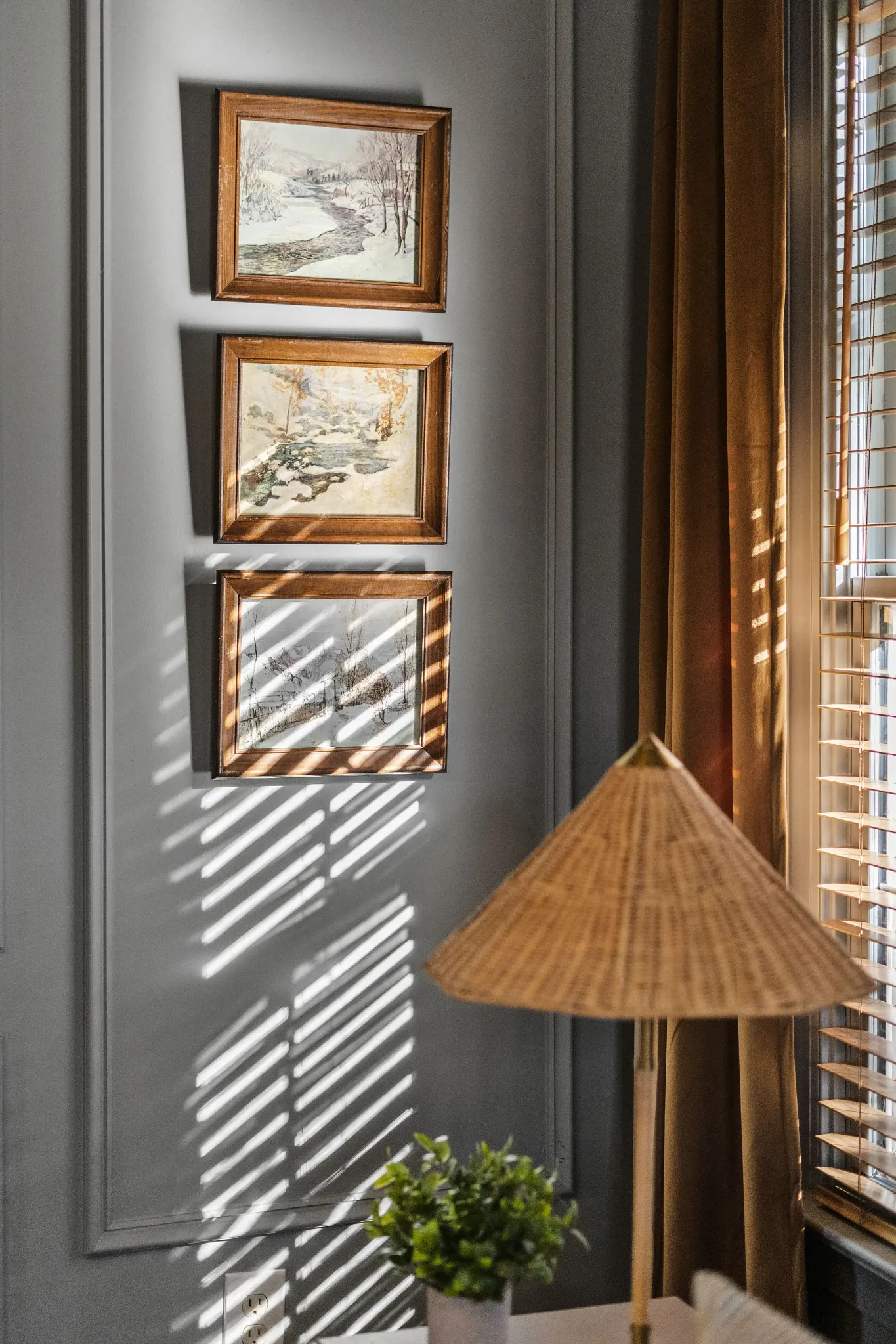 Artwork and lighting detail in a finished interior